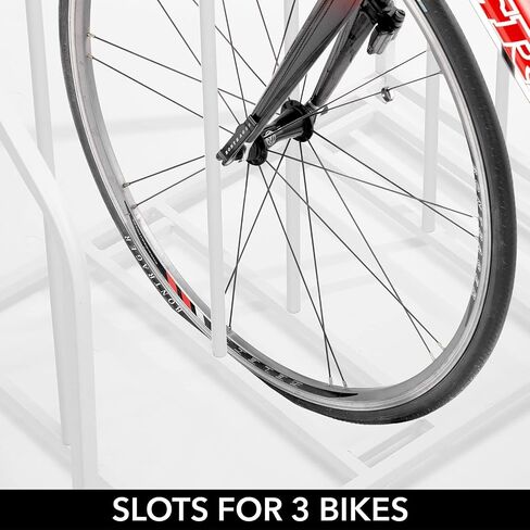 mDesign Free-Standing Metal Bike Rack Stand with Storage Shelf - Garage Bicycle Organizer for Kids Bike, Mountain Bikes; Slots for 3 Bikes; Adjustable Feet; 4 Accessory Hooks - White in Saudi Arabia