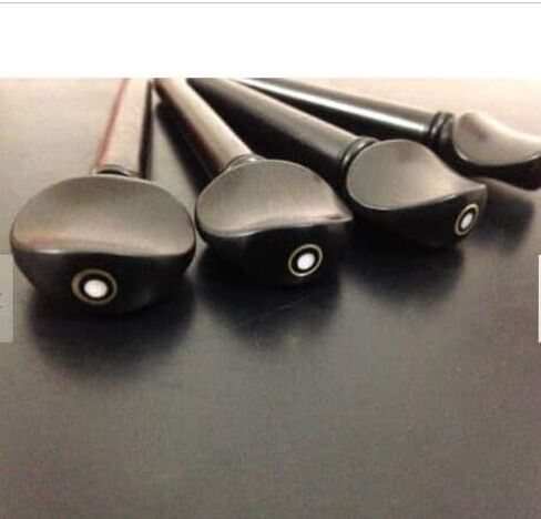 12 pcs Natural Ebony OUD Pegs Swiss Model A quality with Persian Eye 55/9 / 7 mm in Saudi Arabia