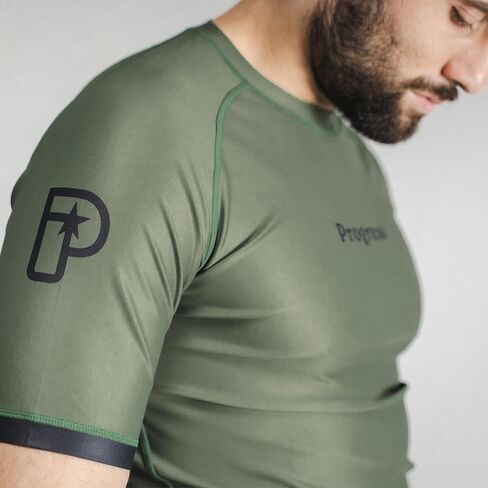 أكاديمية + كم قصير Rashguard | واقي من الطفح الجلدي BJJ مرن ومتين | قمصان ضغط ماصة للرطوبة للرجال والنساء | 80% بوليستر/20% سباندكس (L، كاكي) in Kuwait