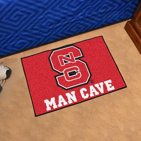FANMATS 14576 NCAA - NC State Wolfpack Man Cave Starter Mat Accent Rug - 19in. x 30in. | Sports Fan Home Decor Rug and Tailgating Mat - "NCS" Primary Logo in Saudi Arabia