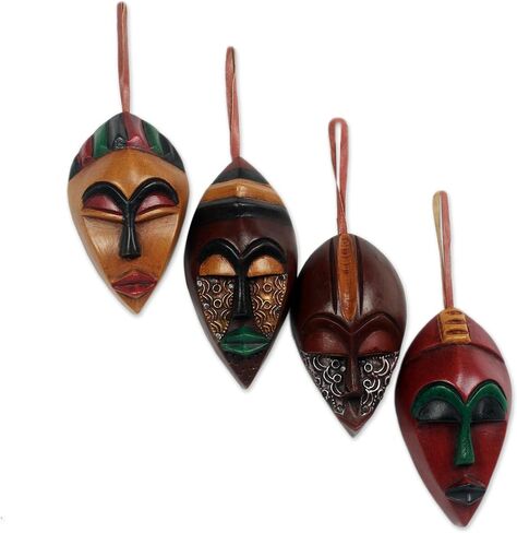 NOVICA Decorative Christmas Wood Hanging Holiday Ornaments, Assorted 'Celebration Masks' (Set of 4) in Saudi Arabia
