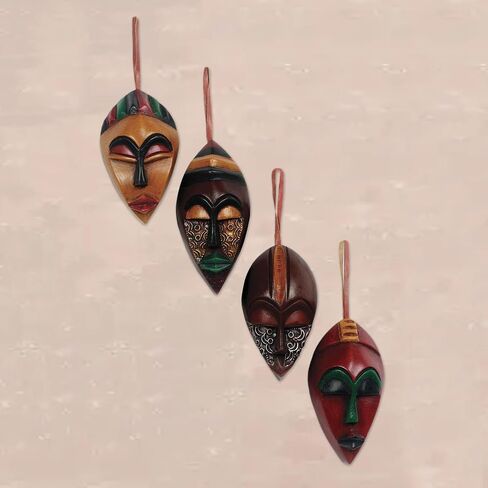 NOVICA Decorative Christmas Wood Hanging Holiday Ornaments, Assorted 'Celebration Masks' (Set of 4) in Saudi Arabia