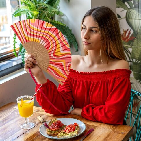 Fisura - Original folding fan with clouds print. Modern and colorful wooden folding fan. Blue design, Hanger included. Measures: 42,5 x 23 cm in Saudi Arabia