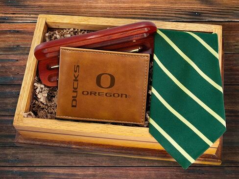 محفظة Rico Industries NCAA Oregon Ducks Premium محفورة بالليزر من الجلد البني النباتي قابلة للطي - تصميم نحيف ولكنه متين - مثالية لإظهار فخر فريقك أو هديتك in Saudi Arabia