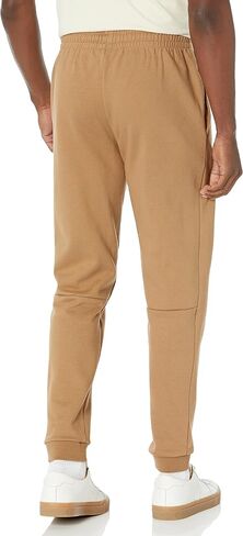 Lacoste mens Tapered Fit Fleece Trackpants Casual Pants in Saudi Arabia
