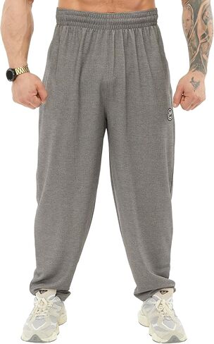Men's Loose Fit Cotton Sweatpants with Zippered Pockets, Gym Lifestyle Pants in Saudi Arabia