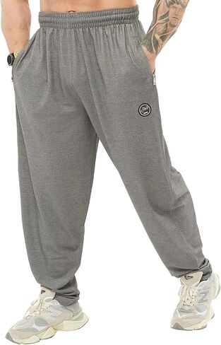 Men's Loose Fit Cotton Sweatpants with Zippered Pockets, Gym Lifestyle Pants in Saudi Arabia
