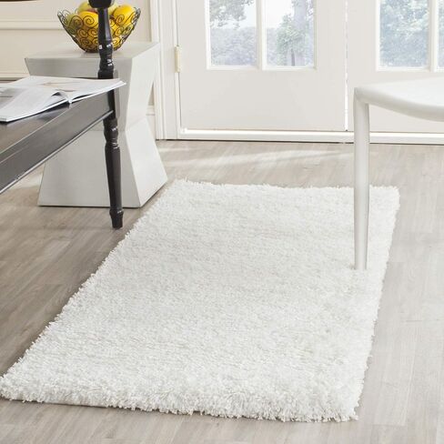 سجادة SAFAVIEH California Shag Collection - 2'3" x 5'، بيضاء، غير قابلة للتساقط وسهلة العناية، سميكة 2 بوصة مثالية للمناطق ذات حركة المرور العالية في المدخل، غرفة المعيشة، غرفة النوم (SG151-1010) in Saudi Arabia