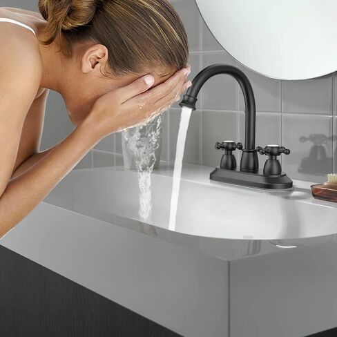 GOWIN Bathroom Faucet, 3-Hole, Matte Black, Sink Faucet, 4 Inch, 2-Handle, Swivel Gooseneck, Includes Drain Assembly, Stainless Steel in Saudi Arabia