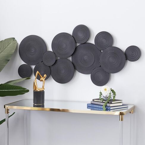 CosmoLiving by Cosmopolitan Metal Plate Home Wall Decor Wall Sculpture with Textured Circles, Wall Art 49" x 3" x 24", Gold in Saudi Arabia