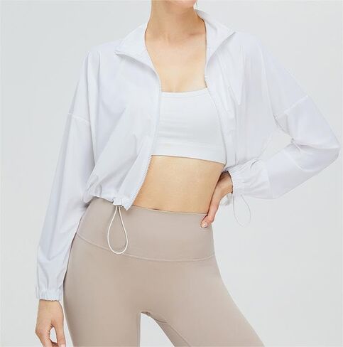 قميص نسائي رياضي بعامل حماية من أشعة الشمس 50+ واقٍ من الشمس بأكمام طويلة، سترة يوغا سريعة الجفاف بسحّاب للتمرين in Kuwait