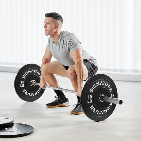 لوحة وزن لوحة وزن أوليمبية ممتصة للصدمات مقاس 5.08 سم من Signature Fitness مع محور فولاذي أو زوج أو مجموعة in Kuwait