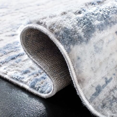SAFAVIEH Amelia Collection Runner Rug - 2'2" x 8', Ivory & Blue, Modern Abstract Design, Non-Shedding & Easy Care, Ideal for High Traffic Areas in Living Room, Bedroom (ALA768A) in Saudi Arabia