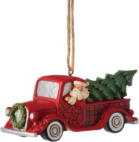 Enesco Jim Shore Heartwood Creek Four Seasons Highland Santa Plaid Red Truck Ornament in Saudi Arabia