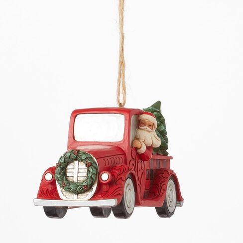 Enesco Jim Shore Heartwood Creek Four Seasons Highland Santa Plaid Red Truck Ornament in Saudi Arabia