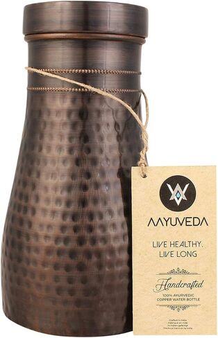 AAYUVEDA® Hammered Pure Copper Bedroom Water Bottle 34oz, with In-Built Tumbler (Loose Lid, Pack of 1) in Saudi Arabia