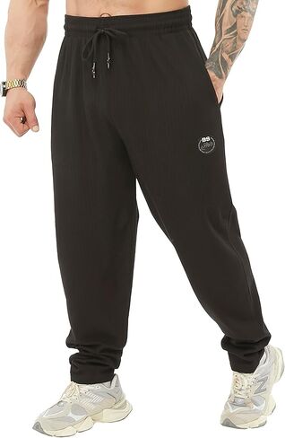 بنطال رياضي قطني فضفاض للرجال مع جيوب، بنطال نمط الحياة للفصول الأربعة in Kuwait