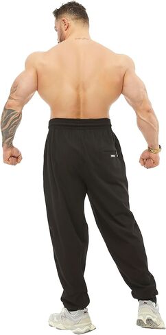 بنطال رياضي قطني فضفاض للرجال مع جيوب، بنطال نمط الحياة للفصول الأربعة in Kuwait