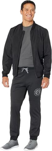 بنطال UFC® Basic Tech-Joggers للرجال - مثالي للصالة الرياضية والمشي والترفيه - 100% بوليستر - خصر قابل للتمدد in Saudi Arabia