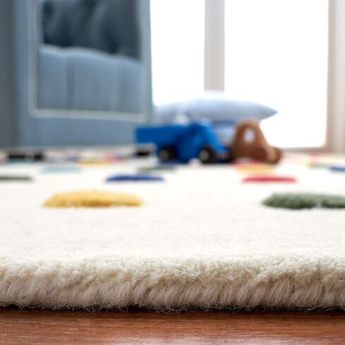 SAFAVIEH Kids Collection Accent Rug - 4' x 6', Ivory, Handmade Polka Dot Wool, Ideal for High Traffic Areas in Playroom, Nursery, Bedroom (SFK804A) in Saudi Arabia