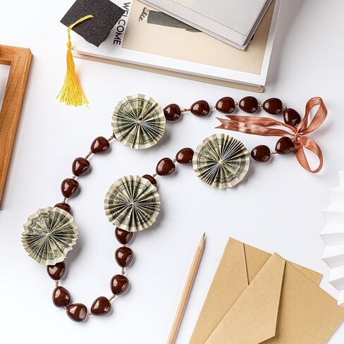 Karenhi Hawaiian Kukui Nut Lei Necklace 47 In Hawaiian Lei Necklace with Ribbon Bow 2024 Graduation Gift for Women Men Kids Luau Party Accessories in Saudi Arabia