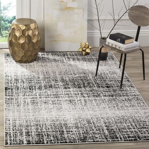 سجادة SAFAVIEH Adirondack Collection - 3' x 5'، عاجي وأسود، تصميم تجريدي حديث، لا يتساقط ويسهل العناية به، مثالي للمناطق ذات حركة المرور العالية في المدخل، وغرفة المعيشة، وغرفة النوم (ADR116B) in Saudi Arabia