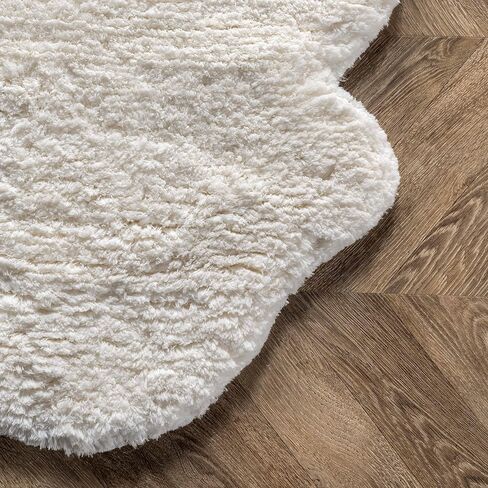 nuLOOM Quarto Faux Sheepskin Shag Area Rug, Shaped 4x6, Natural in Saudi Arabia