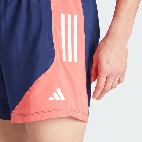 شورت رجالي من adidas Own The Run Base Colorblock، أزرق داكن/حبر Preloved/قرمزي Preloved، مقاس XX-Large in Saudi Arabia