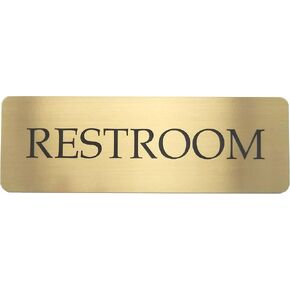 Brass Restroom Sign that shines like gold