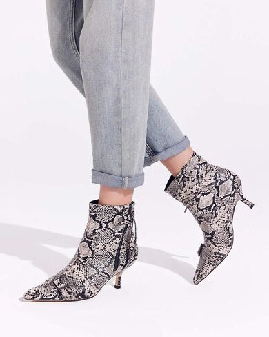 Coutgo Womens Pointed Toe Ankle Boots Sexy Low Kitten Heel Buckle Booties Side Zipper Tassel Winter Dress Shoes in Saudi Arabia