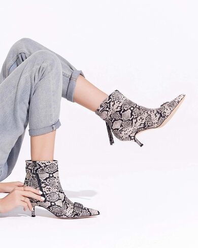Coutgo Womens Pointed Toe Ankle Boots Sexy Low Kitten Heel Buckle Booties Side Zipper Tassel Winter Dress Shoes in Saudi Arabia