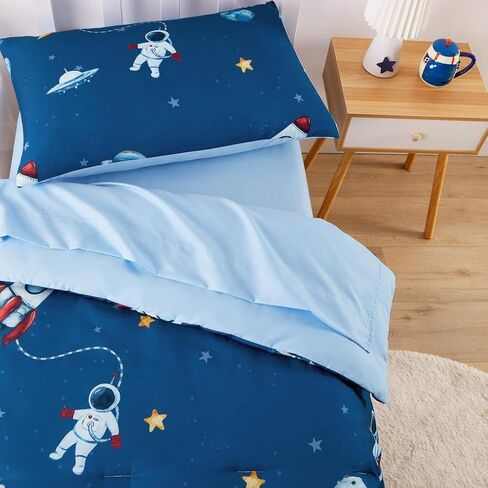 Wake In Cloud - Space Toddler Bedding Set for Boys, Cute Rocket Space Ship Astronaut, 4 Pieces Soft Crib Bed Set Including Comforter, Sheets and Pillowcase, Navy Blue in Kuwait