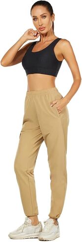 سراويل ADOREISM النسائية للمشي لمسافات طويلة سريعة الجفاف ومقاومة للماء وخفيفة الوزن للنساء مع جيوب متعددة in Kuwait