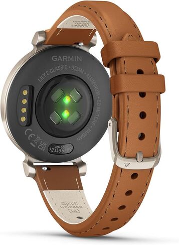 حزمة ساعة اللياقة البدنية النسائية PlayBetter Garmin Lily 2 Classic (ذهبي كريمي/جلد أسمر ضارب للصفرة) - ساعة للسيدات مع شاشة مخفية، بطارية تدوم 5 أيام ودفع Garmin - تتضمن شاحن محمول in Kuwait