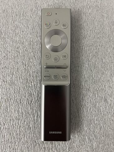 جهاز التحكم عن بعد للتلفزيون الذكي الأصلي من سامسونج BN59-01346A مع الصوت وتطبيقات البث وحافظة معدنية فضية ممتازة in Kuwait