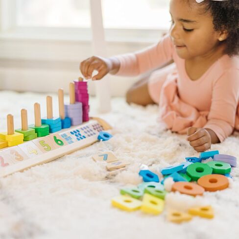 Melissa & Doug Counting Shape Stacker - Wooden Educational Toy With 55 Shapes and 10 Number Tiles in Saudi Arabia