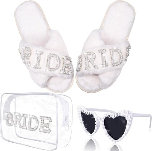 تشتمل مجموعة هدايا Bride To Be على شباشب ناعمة من حجر الراين وحروف BRIDE Bride وحقيبة مكياج العروس الشفافة ونظارات شمسية على شكل قلب أبيض لأحذية يوم الزفاف، وهدايا حفل الزفاف، وهدية العازبة in Kuwait