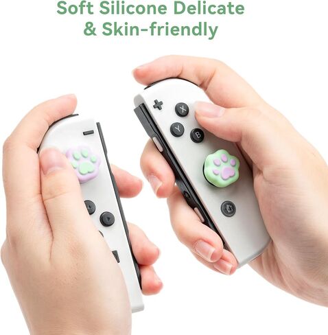 GeekShare Thumb Grip Caps for Switch 4PCS Cute Cat Paw Shape Silicone Joystick Caps Soft Thumbstick Cover Compatible with Nintendo Switch/OLED/Switch Lite - Pink & Yellow (Pink&Yellow) in Saudi Arabia