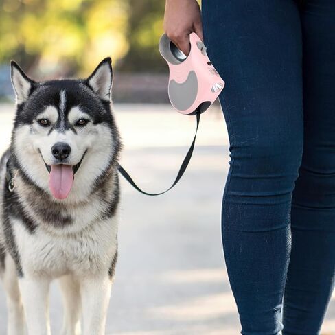 Retractable Dog Leash with Flashlight 16ft Walking Leash for Dogs up to 77lbs, 360° Tangle-Free Nylon Tape Anti-Slip Handle -Pink in Saudi Arabia
