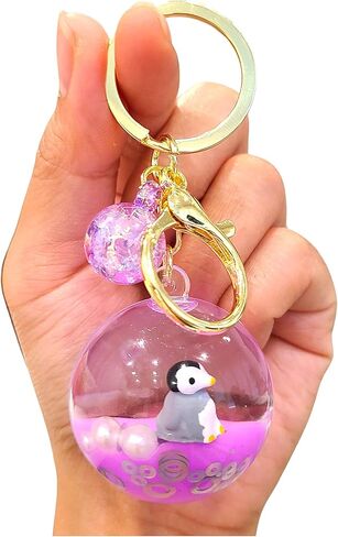 SPEEDYUNI سلسلة مفاتيح على شكل حيوانات بحرية | حامل حلقة مفاتيح على شكل حيوانات البحر السائلة الجمالية العائمة لسحر الحقائب ومفاتيح السيارة in Kuwait