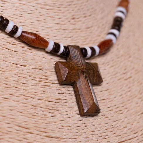 BlueRica Hand Carved Wood Cross on Brown Coconut & Puka Shell Beads Necklace (18") in Saudi Arabia