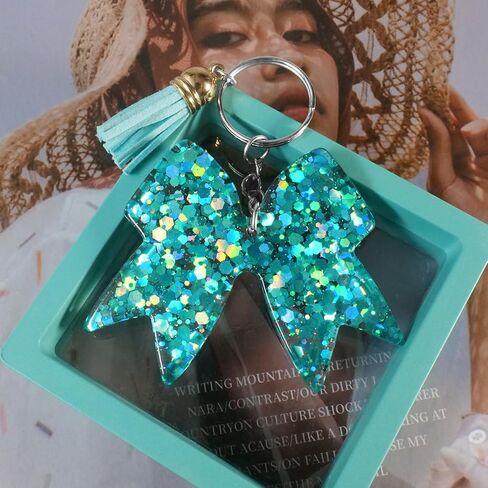سلسلة مفاتيح لامعة على شكل فيونكة - سلاسل مفاتيح ساحرة للفتيات ملحقات حقيبة الظهر التشجيعية، هدية مبهجة لقادة المشجعين وأعضاء الفريق - أزرق فاتح/قطعتين in Kuwait