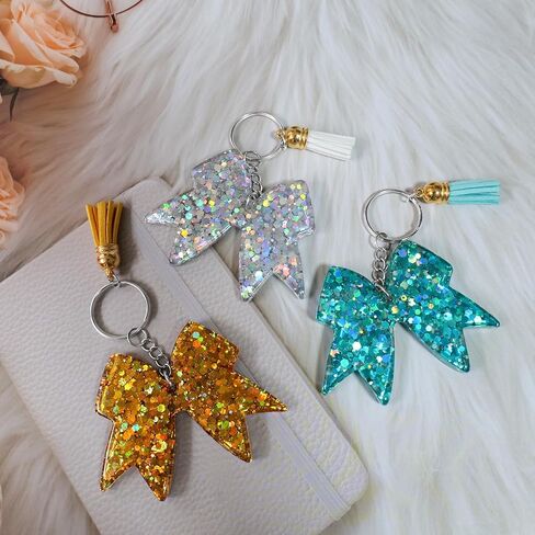 سلسلة مفاتيح لامعة على شكل فيونكة - سلاسل مفاتيح ساحرة للفتيات ملحقات حقيبة الظهر التشجيعية، هدية مبهجة لقادة المشجعين وأعضاء الفريق - أزرق فاتح/قطعتين in Kuwait