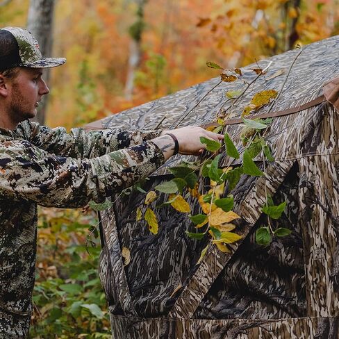 Barronett Blinds® Memory Maker 5، ستارة صيد محمولة، ستارة محورية بخمسة جوانب، قماش دينير 600، نوافذ منزلقة صامتة، 4 أشخاص، حامل الشجرة الأصلي Mossy Oak®، 72 بوصة × 96 بوصة × 96 بوصة in Kuwait