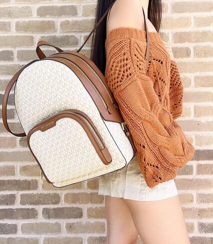 Michael Kors Jaycee Large Backpack School Bag Bundled Jet Set Travel Large Trifold Wallet MK Signature (Vanilla MK) in Saudi Arabia