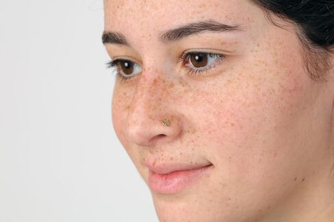 Lavari Jewelers 20 Gauge Curved Screw Nose Ring in 14k Yellow Gold Unisex Stud Nose Ring Hypoallergenic Nostril Piercing Jewelry 20G Body Piercing in Saudi Arabia