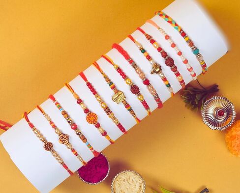 Raksha Bandhan Set of 12 Rakhi for Brother Bhai with Raksha Bandhan Greeting Card & Roli Chawal Tika | Turtle Pearl Rakhi for Brother & Bhabhi | Designer Om Bro Rakhi for Small Brother Bhaiya | Rakhi Thread MHNJ008 in Saudi Arabia