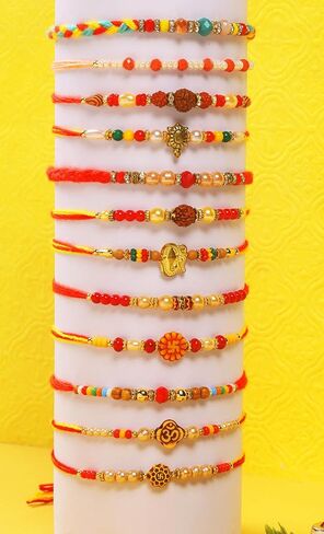 Raksha Bandhan Set of 12 Rakhi for Brother Bhai with Raksha Bandhan Greeting Card & Roli Chawal Tika | Turtle Pearl Rakhi for Brother & Bhabhi | Designer Om Bro Rakhi for Small Brother Bhaiya | Rakhi Thread MHNJ008 in Saudi Arabia
