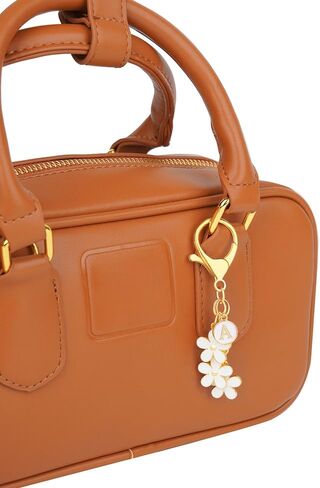 Cute Initial Keychain Pink White Flower Charms for Keys Letter Keyring for Women Purse Handbag in Saudi Arabia
