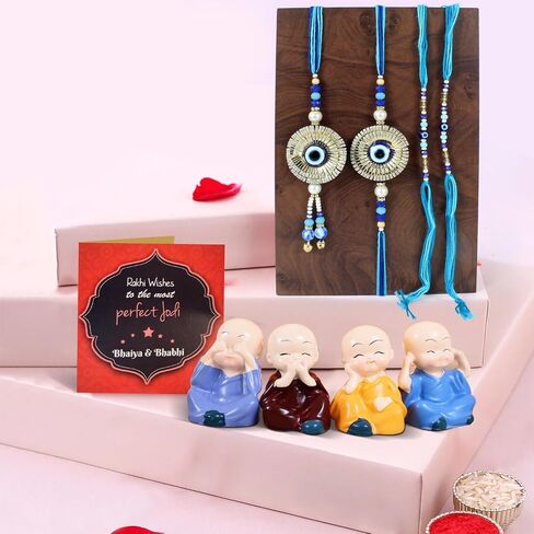TIED RIBBONS Rakhi for Brother and Bhabhi and Bhatija | Rakhi for Bhatija (Set of 2) | Buddha Monk Statue Set of 4 | Mini Card | Roli Tikka - Bhai Bhabhi Rakhi Set | Lumba Rakhi for Bhabhi in Saudi Arabia